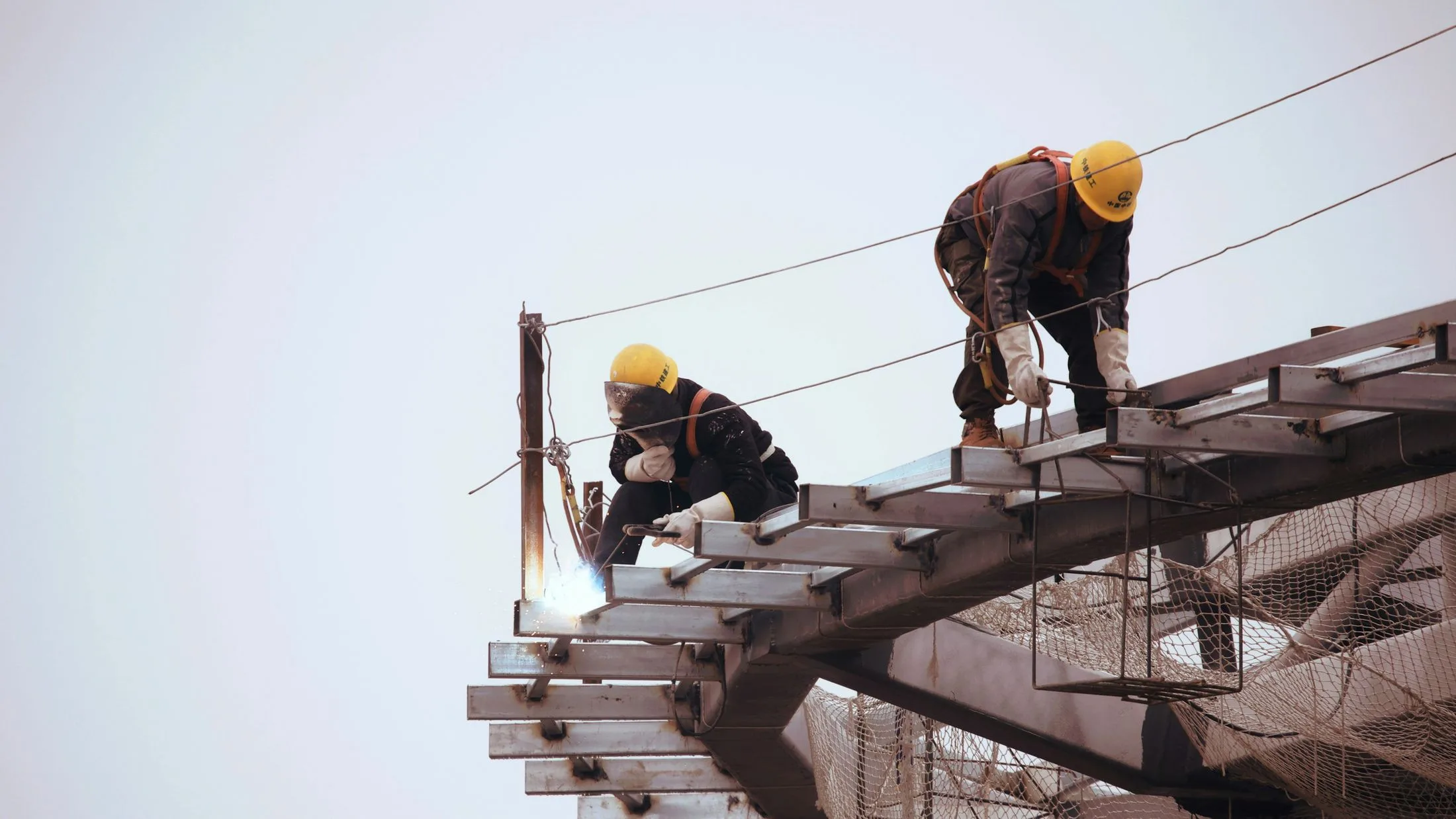 A roofer completing a final check on the roof