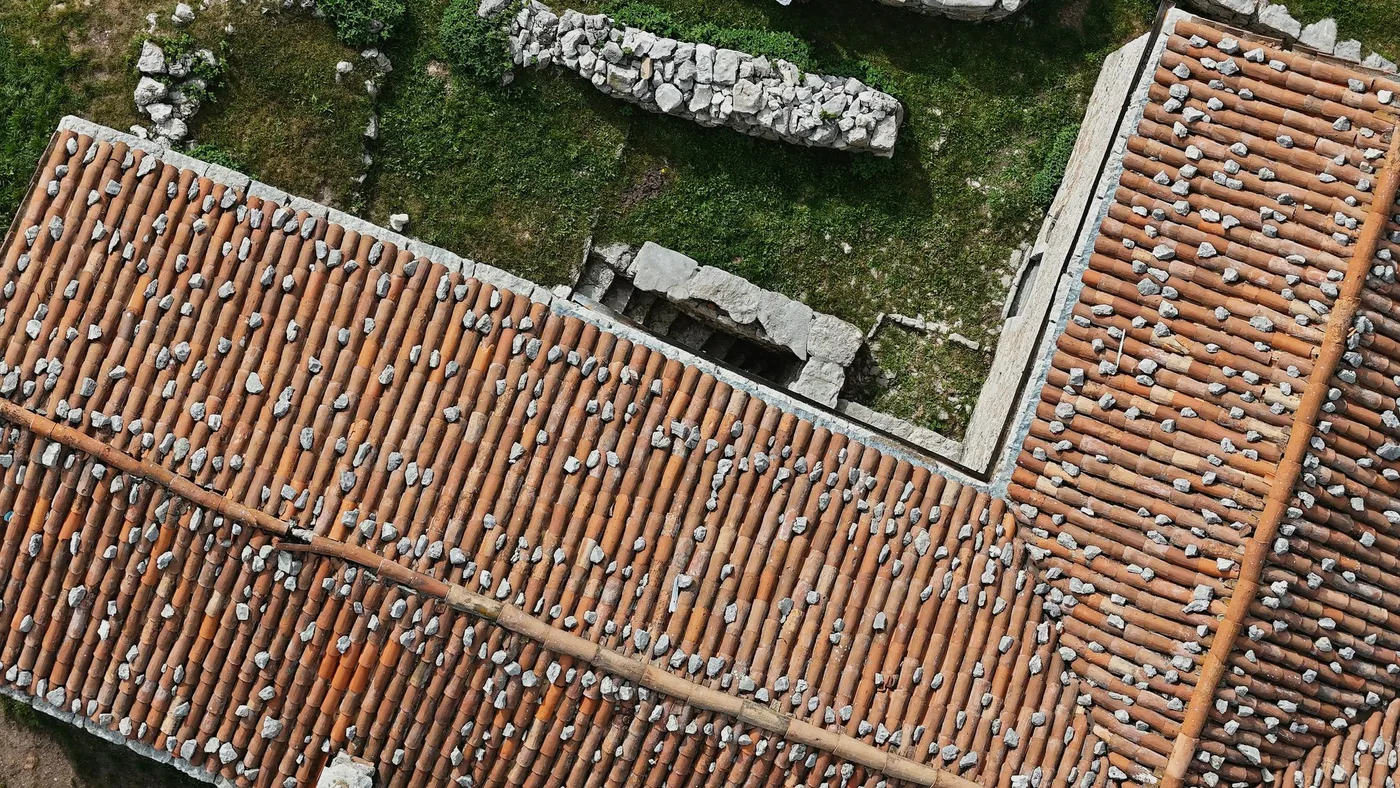 A field of tile roofing seen close